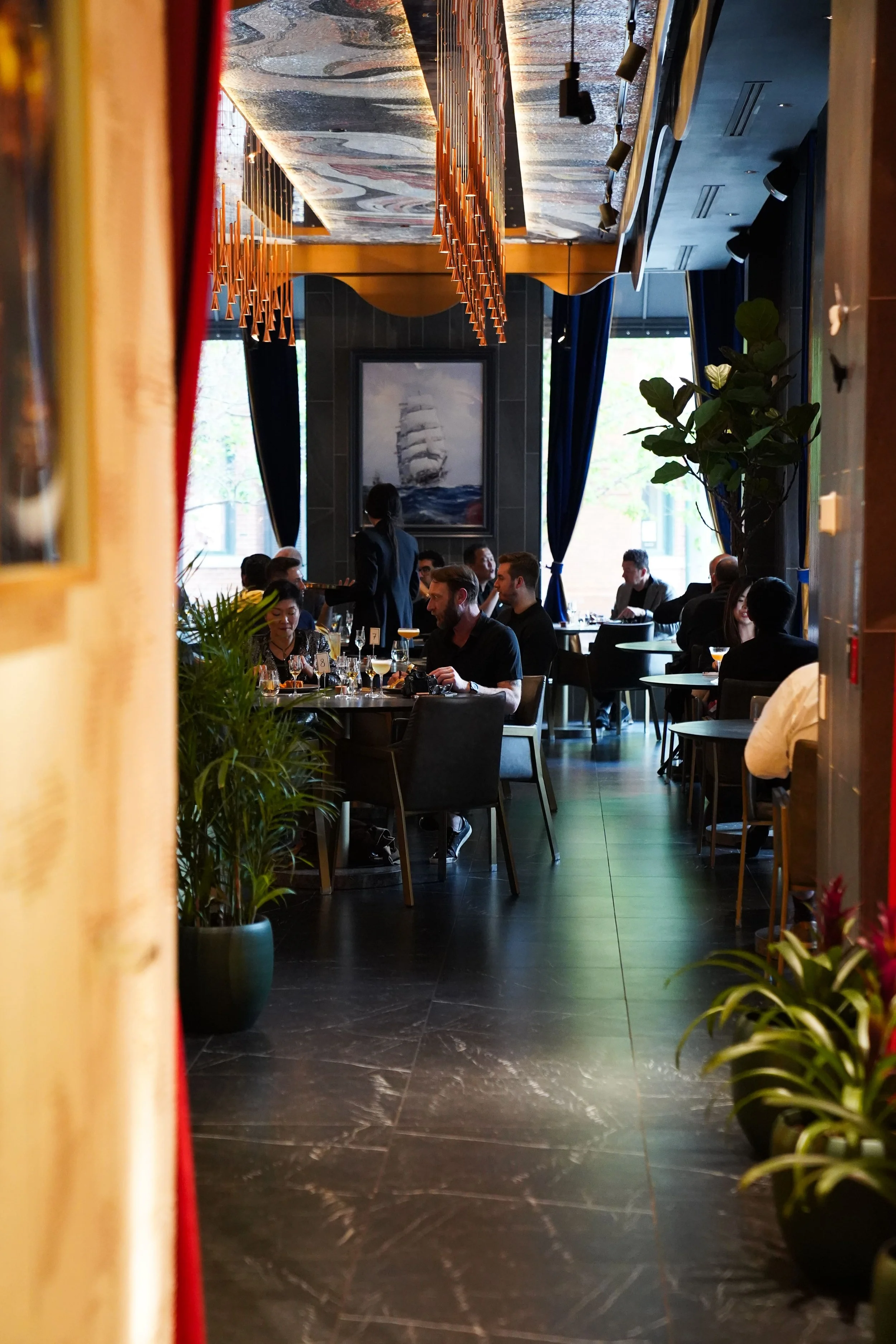 Guests dining during an event at Enigma Yorkville